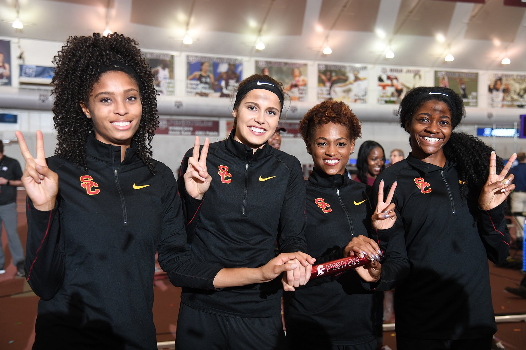 USC’s champion relay team: Cameron Pettigrew, Amalie Iuel, Deanna Hill and Kendall Ellis