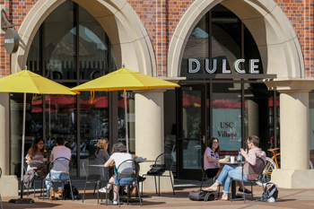 Students outside of Dulce in the USC Village.