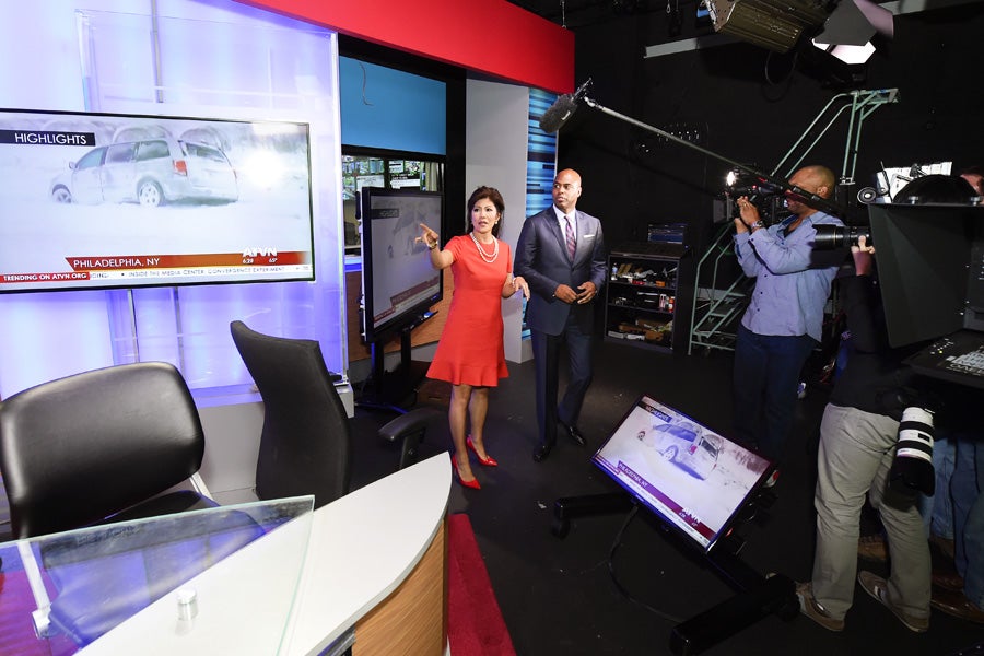 Julie Chen gives ET personality Kevin Frazier a tour of the media center