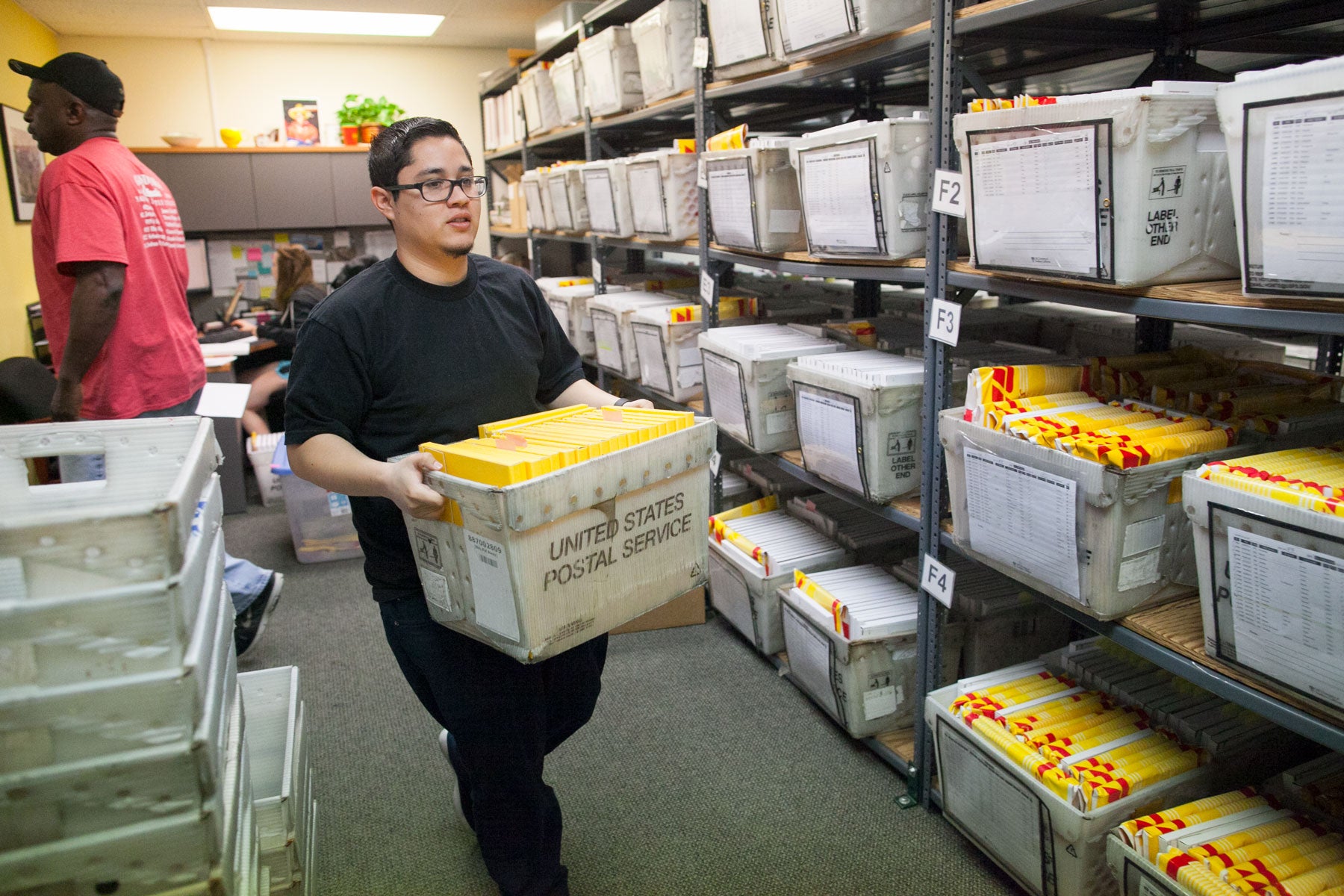 Admissions workers preparing mailings