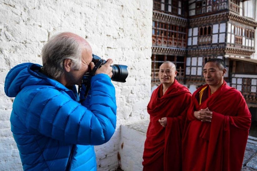 Barry Shaffer photographing monks