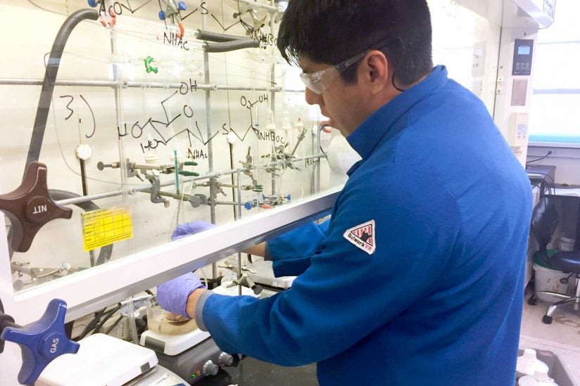 Jose Ricardo Moreno working in fume hood