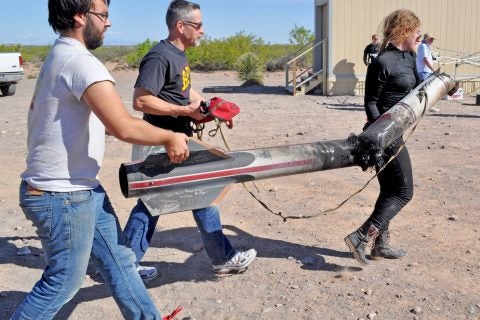 fascination with flight: Cimo helps carry at rocket after a launch with RPL