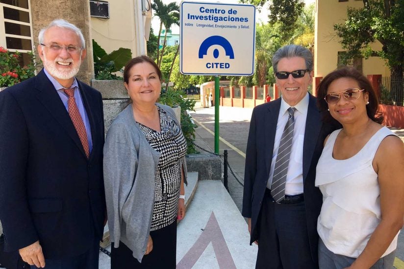 group photo in cuba of four experts