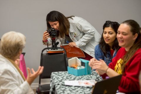 USC students working with seniors on design