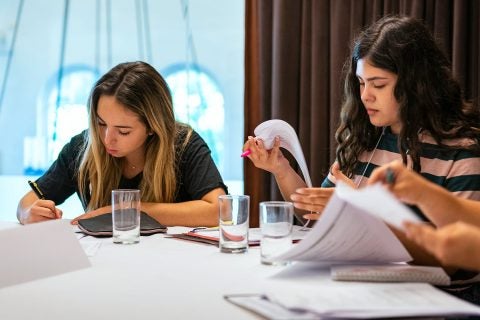 First generation college student programs: Kierra Valdez-McClure and Victoria Nunez fill out an academic planning guide.
