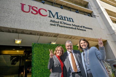 USC Mann naming ceremony: President Carol L. Folt, Dean Vassilios Papadopoulos and Trustee Chair Suzanne Nora Johnson
