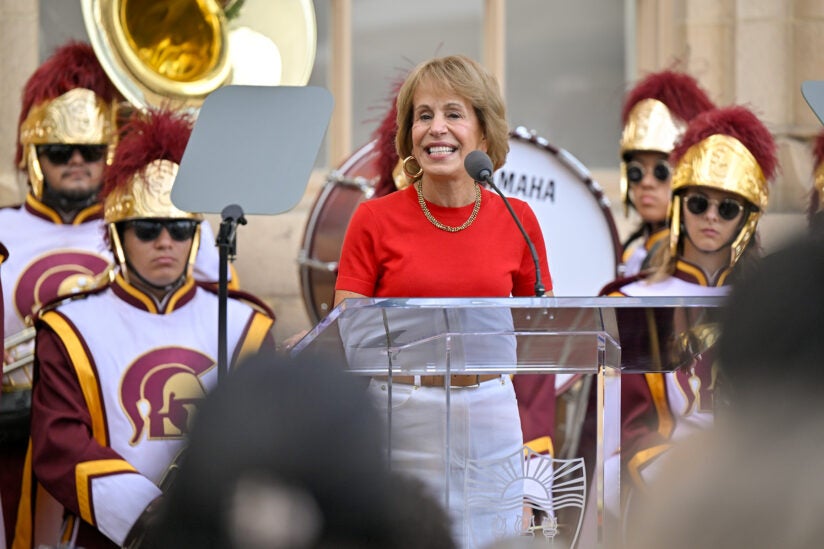 USC Sustainability Hub: Carol L. Folt and members of the USC Trojan Marching Band