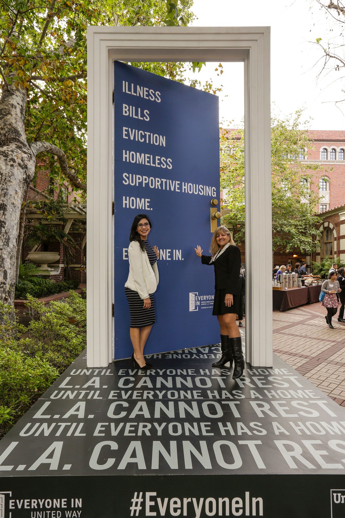 Celeste Rodriguez and Brenda Wiewel at the Ending Homelessness summit at USC