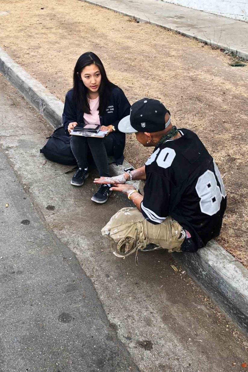 USC student Jessica Yun conducting survey