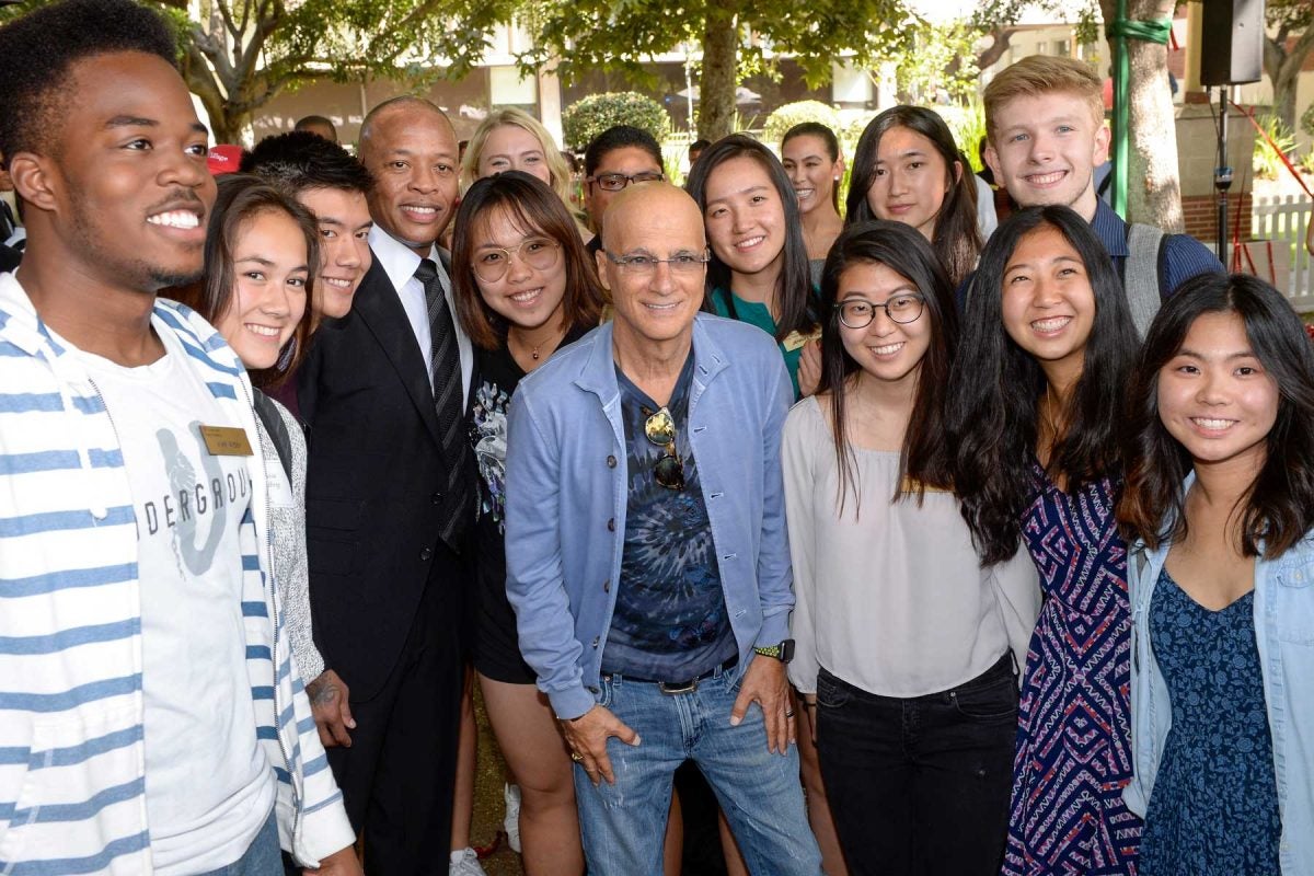 Andre Young and Jimmy Iovine with students