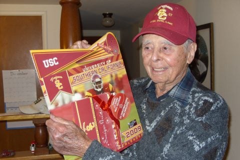 John Schmidhauser at age 86 wearing USC hat 