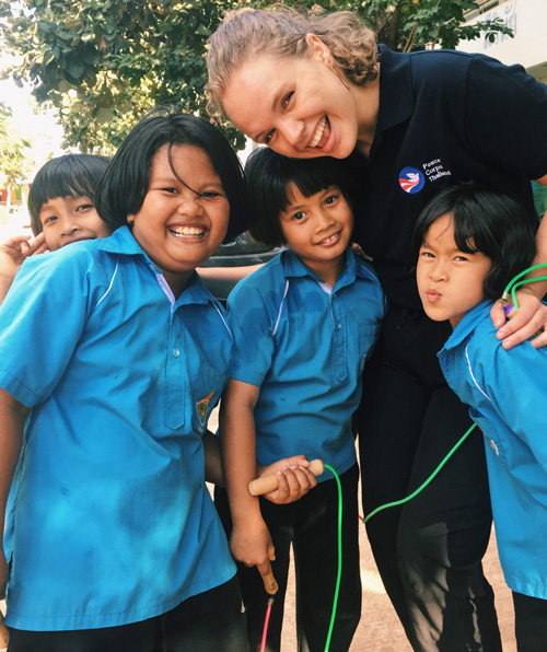 Sierra Drummond with group of young students in Thailand