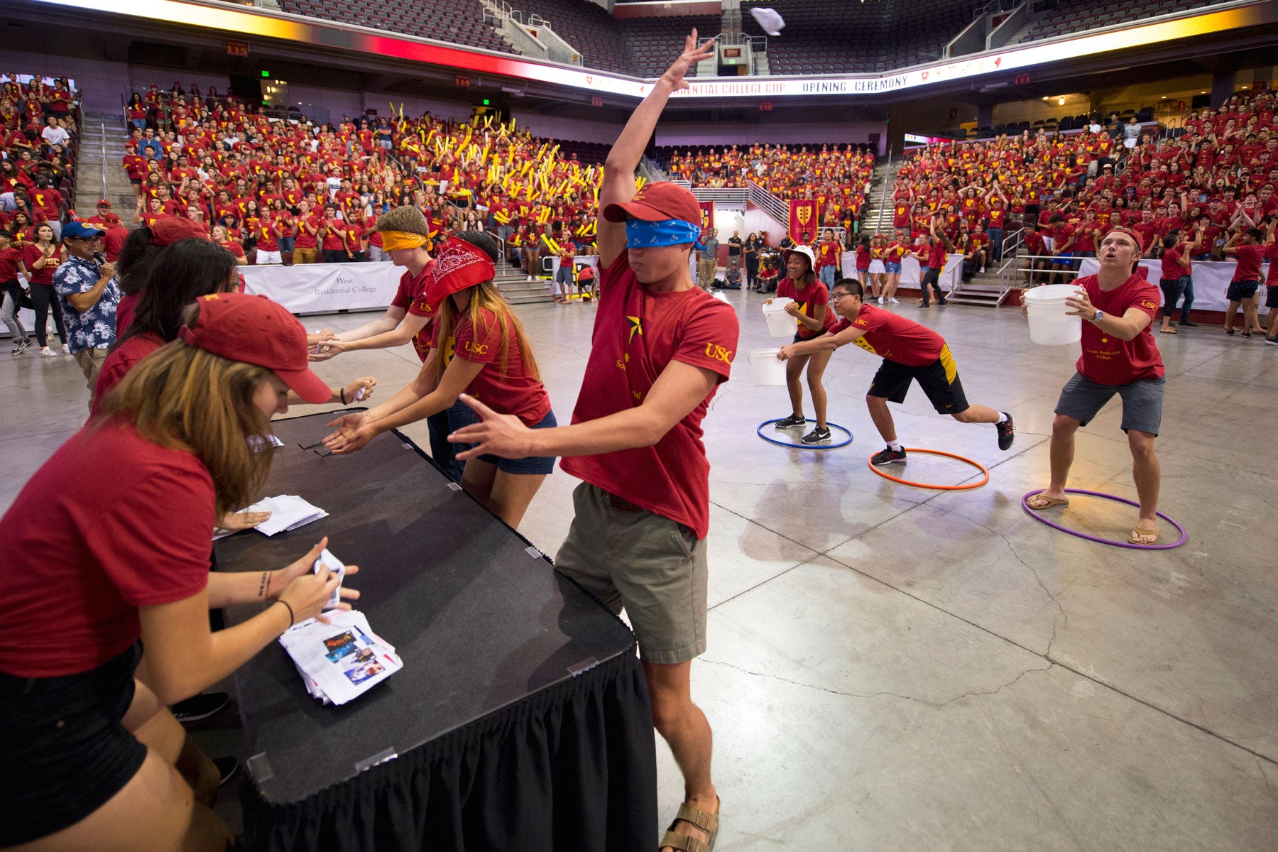 Students playing games in auditorium