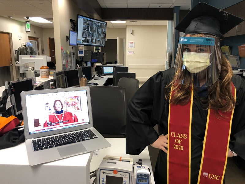 Jennifer Dixon in cap and gown for virtual class of 2020 celebration