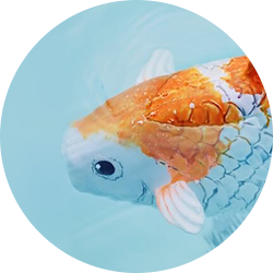 An underwater robot with white and gold coloring and scales resembling a goldfish