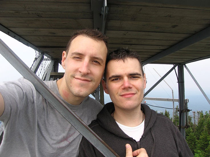 Photo of two men taking a selfie