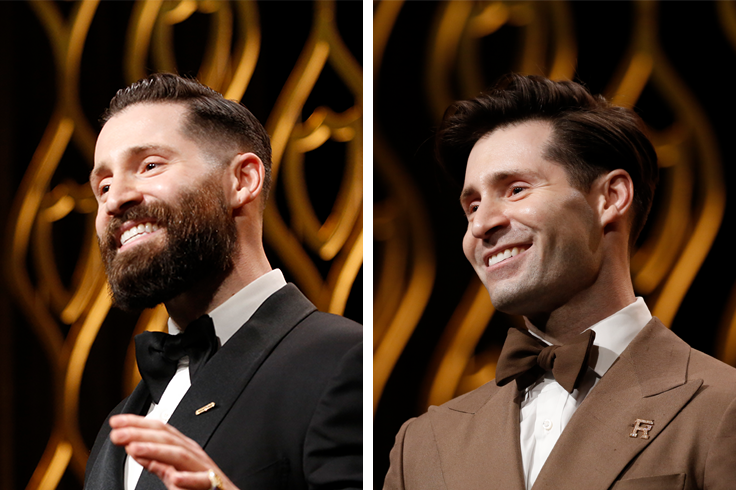 Bearded man receives award and Brown-haired man receives award