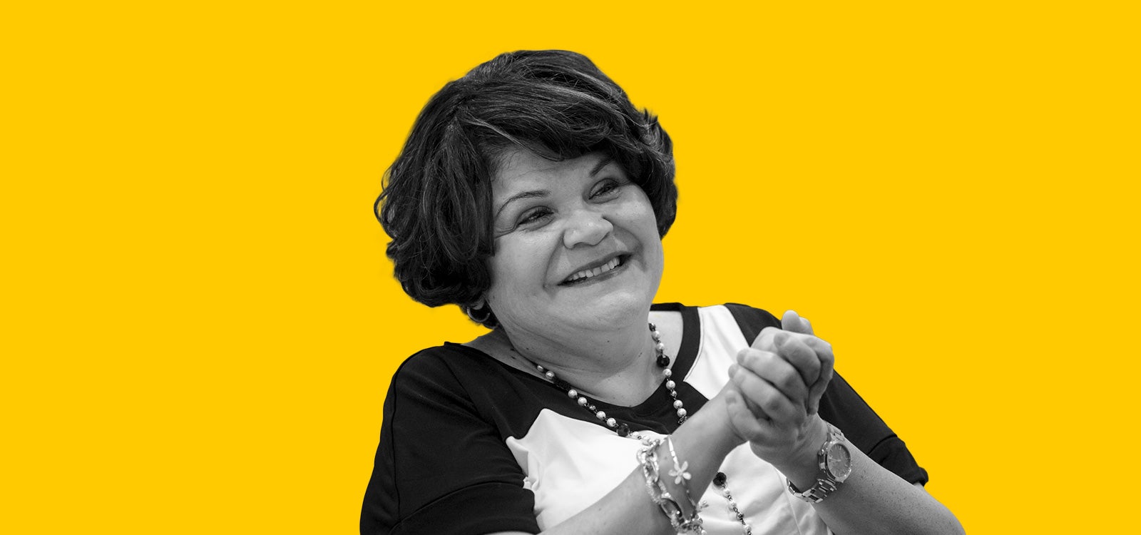 Cut-out black and white profile photo of Martha Escutia, VP of Government Relations