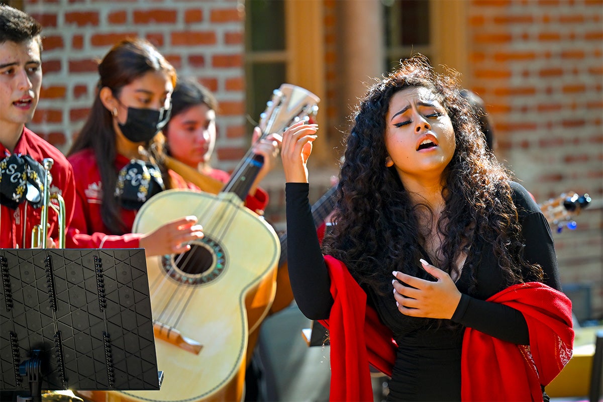 Singer Alondra Santos performs with Mariachi Los Troyanos de USC at the Amy King Dundon-Berchtold University Club of USC at King Stoops Hall.