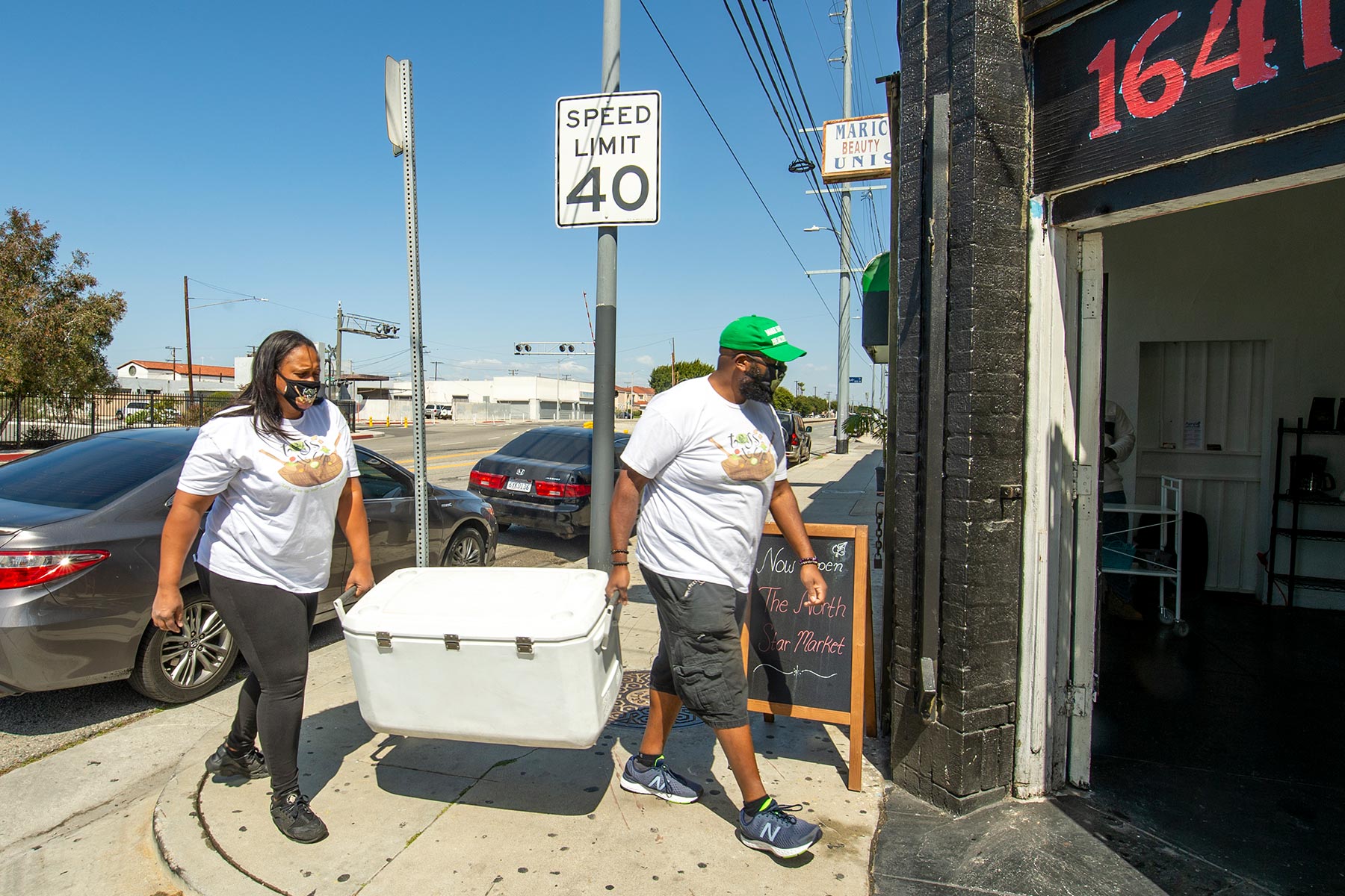 Javonne Sanders and Matthew Crawford deliver salads