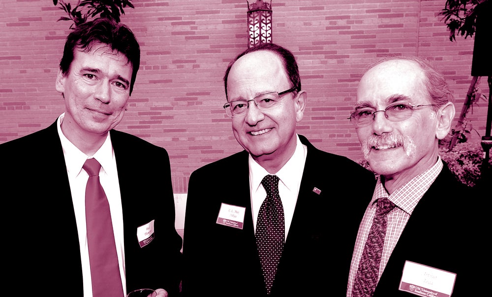 USC President C. L. Max Nikias honors professors Paul Thompson, left and Arthur Toga, right, as they join the USC faculty in Los Angeles September 23, 2013. Photograph by Gus Ruelas