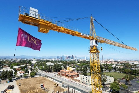 USC flag flies from crane