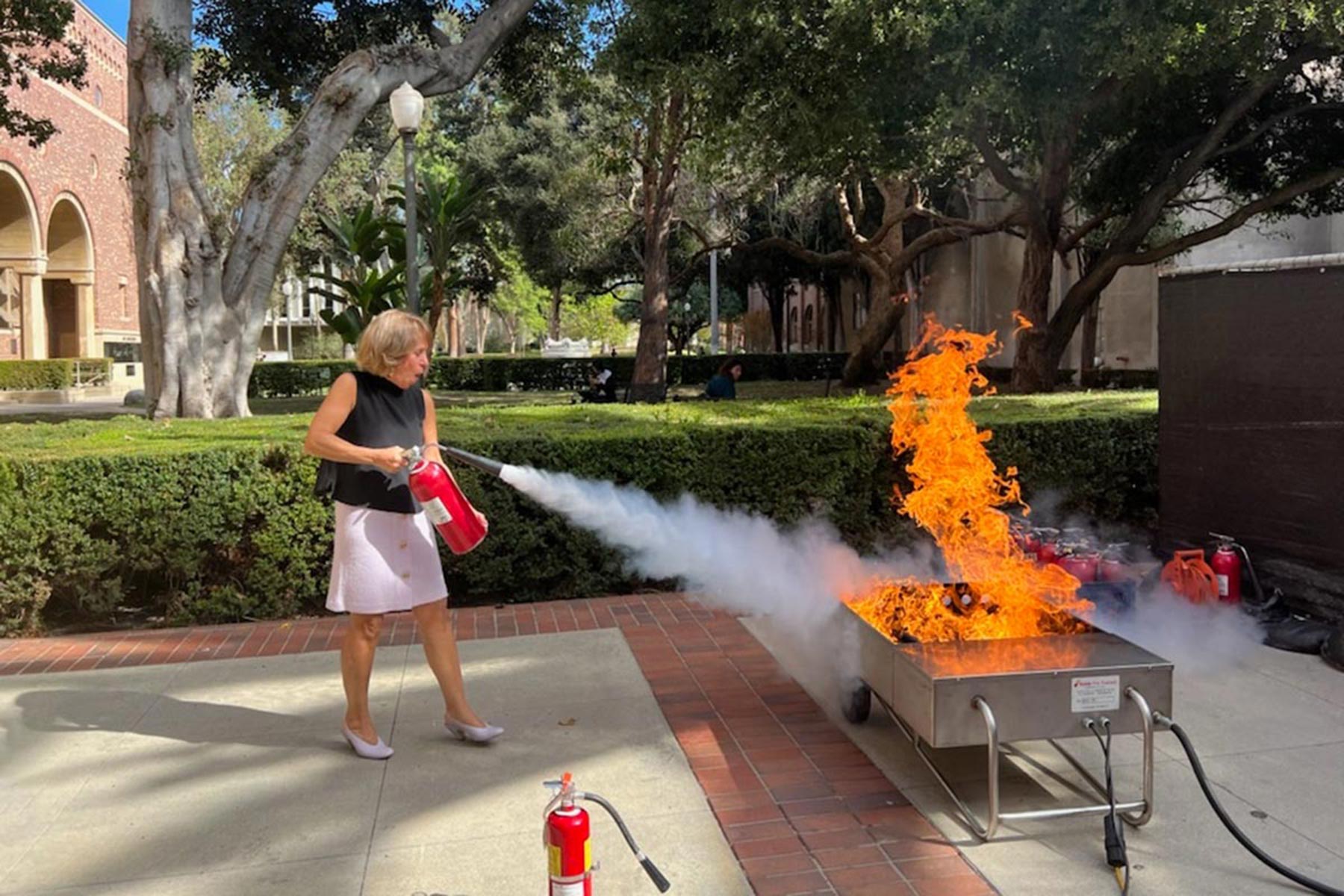 Great ShakeOut: USC President Carol L. Folt puts out fire