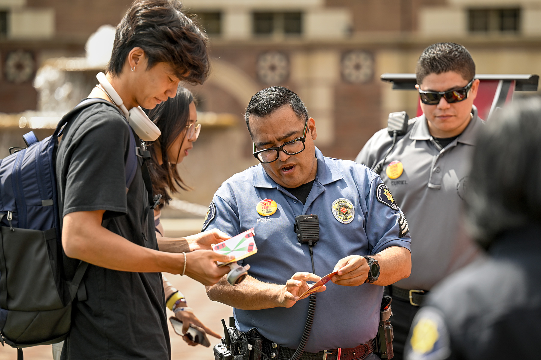 USC Safety Days: Student Kyle Kim talks with DPS Community Service Officer Adrian Pen?a