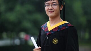 Xinran Ji in cap and gown