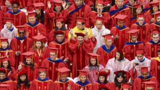Students braving the rain during the USC main commencement ceremony