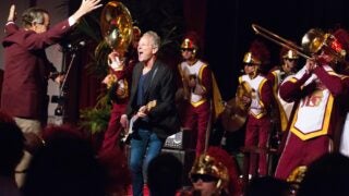 Lindsey Buckingham performing with the USC Trojan Marching Band
