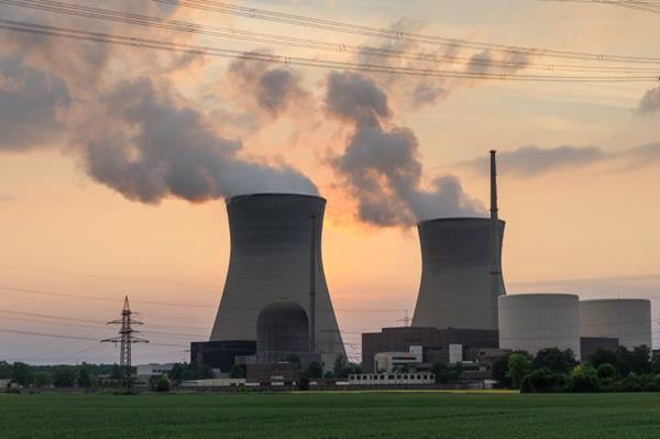 Nuclear power plant with smoking coming out from it