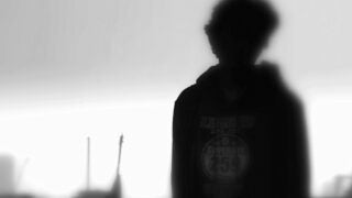 person standing looking away