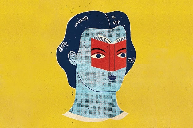 Women head with book covering her eyes