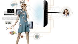 woman connected to health standing in front of a TV