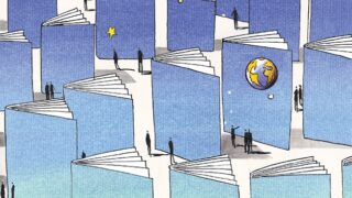 Giant books amongst people with the cover showing a blue skyline and space