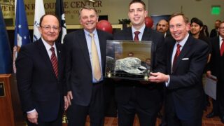 C. L. Max Nikias, left, John Mork, Michael Johnson and David Petraeus gather at the opening of USC's Veterans Resource Center.