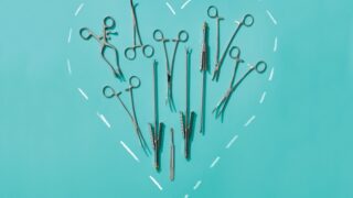 Heart shaped drawing filled with medical tools