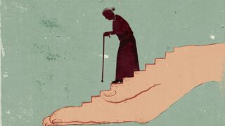 Women walking down a hand which is making stairs