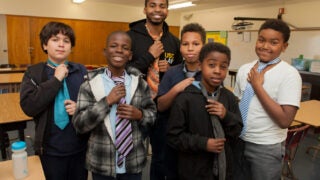 Michael Figgers and elementary students