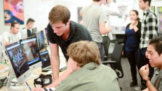 Students working on a group project on a computer
