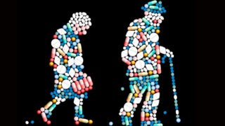 Man with a cane and elderly woman walking