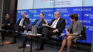 Speakers engaging in a panel discussion