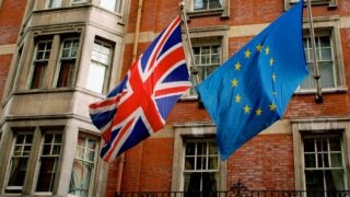 UK and EU flags waving