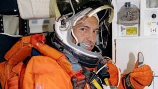 Carlos Noriega in astronaut suit
