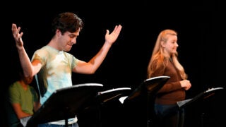 Two students reading their lines during Dramatic Arts workshop