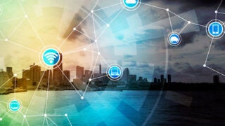 City in background of digital icons