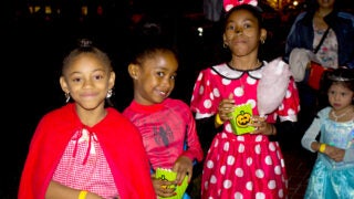 Kids dressed up in Halloween costumes