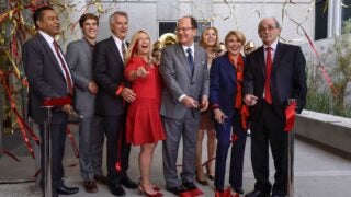 USC dignitaries celebrating opening of USC Stevens Hall during ribbon cutting ceremony